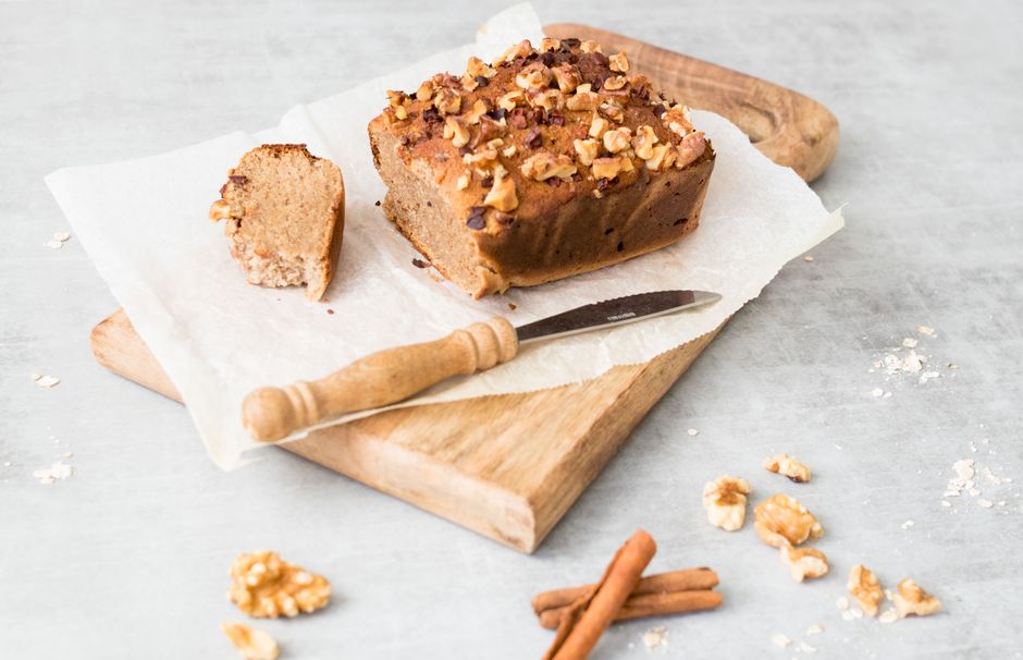 Easy Banana Bread Using Pancake Mix Recipes: The Ultimate Baking Hack 3 A slice of banana nut bread topped with chopped walnuts and a sprinkle of cinnamon