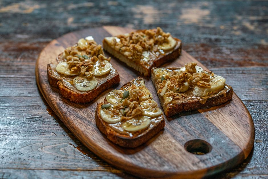 Healthy Low Fat Banana Bread Recipe: Moist, Fluffy, and Easy 3 A slice of low fat banana bread toasted and served with a light spread of honey and fresh fruit on the side.