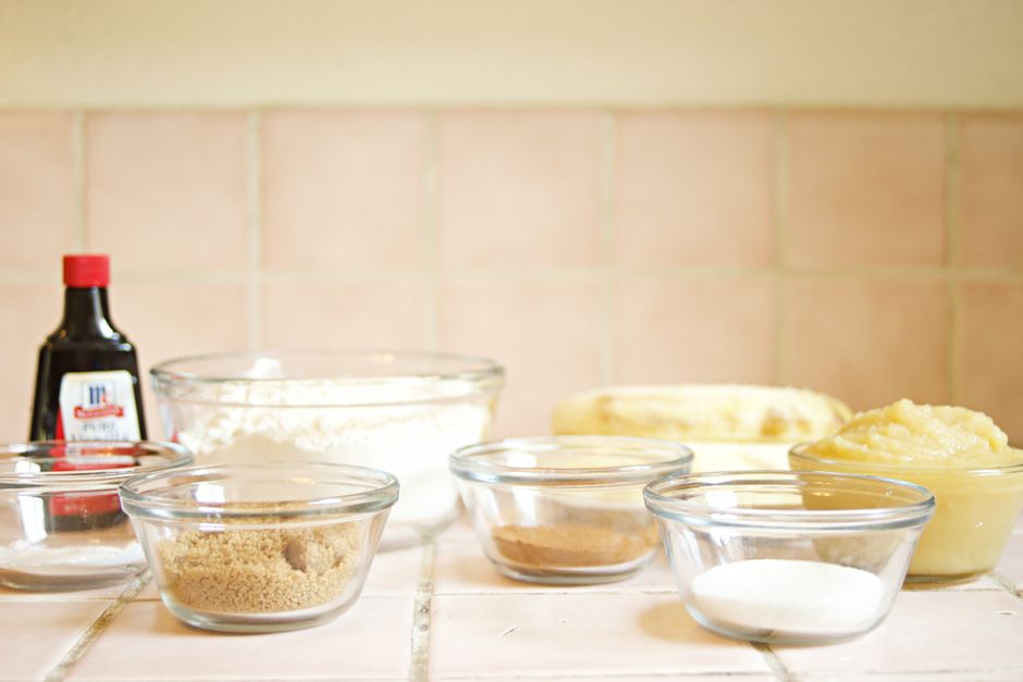Ultimate King Arthur Flour Banana Bread Recipe: Moist & Fluffy 2 Ingredients for the banana bread arranged on a marble kitchen counter, including ripe bananas, King Arthur flour, and spices.