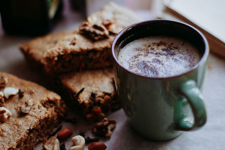 Moist Banana Bread Splenda Recipe: Low Sugar & Delicious 2 Slices of low-sugar banana bread topped with chopped walnuts and a sprinkle of cinnamon next to a cup of black coffee